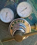 Harris Compressed Gas Regulator 650L Model #25 - 100C. Fixed Price $125.00.