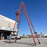 Z Werner Fiberglass Twin Ladder Ft, 300 Lbs Cap Orange T7420. Fixed Price $1120.00.