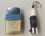 Novelty Lighters Scripto Vu W/playing Cards & Magna Spark Plug Keychain. Fixed Price $27.00.