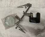Articulating Bench Tool With Alligator Clips And Magnifying Glass. Fixed Price $12.00.