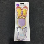 Easter Cookie Cutter Set Of Tulip, Butterfly, And Bunnies Coated Metal 3". Fixed Price $6.99.