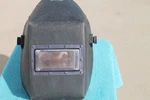 Vintage Huntsman 411P Welding Helmet With Gold Glass Lens Shade. Fixed Price $89.00.