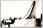 Iron Mountain Michigan Pine Slide & Steps Winter 1947 Rppc. Fixed Price $15.00.